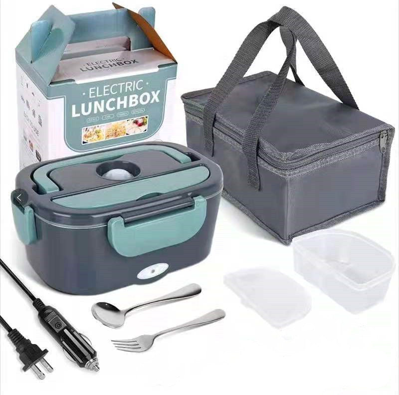 Electric lunchbox set with carrying case, utensils, and power cord on a white background