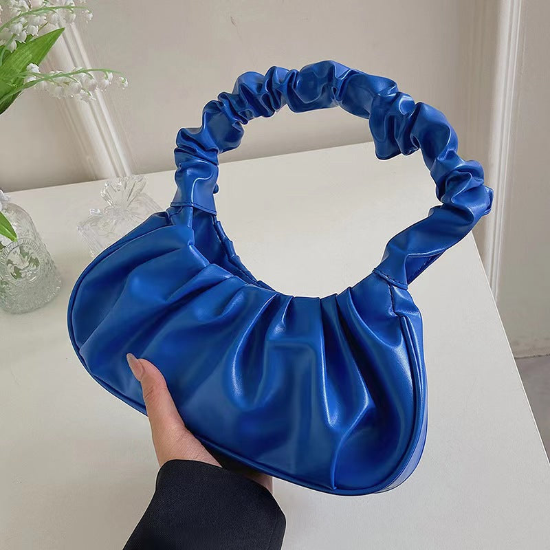 Foreign trade Korean version women's bag 2022 new solid color cloud pleated bag simple women's armpit bag sweet shoulder bag