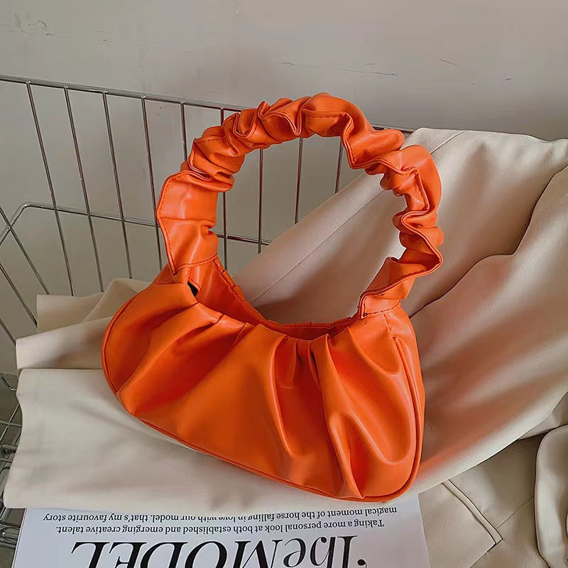 Foreign trade Korean version women's bag 2022 new solid color cloud pleated bag simple women's armpit bag sweet shoulder bag