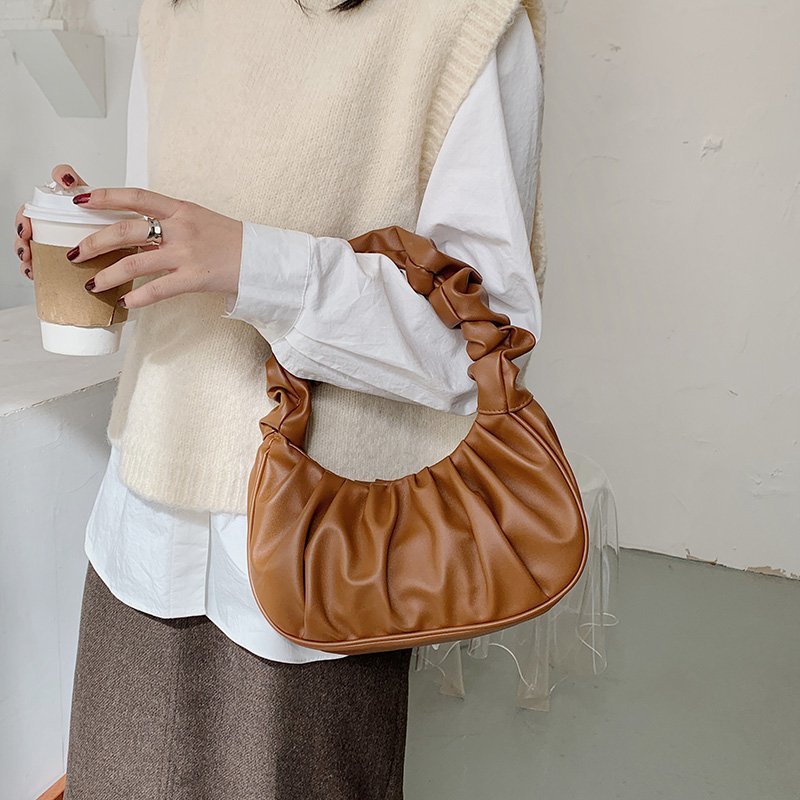 Foreign trade Korean version women's bag 2022 new solid color cloud pleated bag simple women's armpit bag sweet shoulder bag