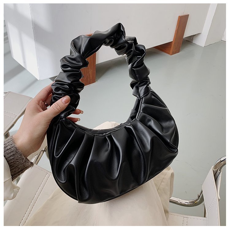 Foreign trade Korean version women's bag 2022 new solid color cloud pleated bag simple women's armpit bag sweet shoulder bag