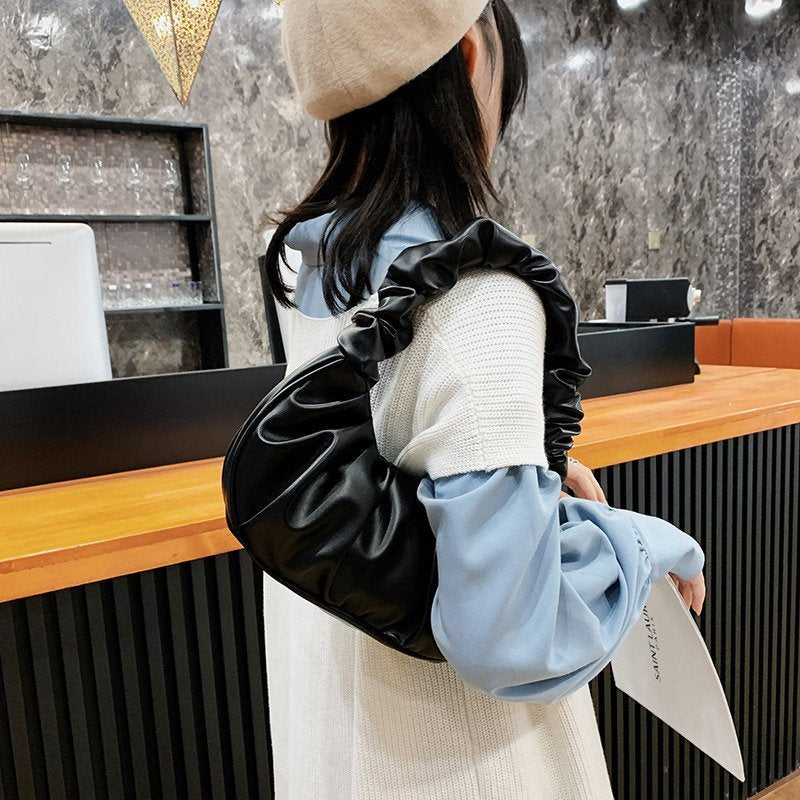 Foreign trade Korean version women's bag 2022 new solid color cloud pleated bag simple women's armpit bag sweet shoulder bag