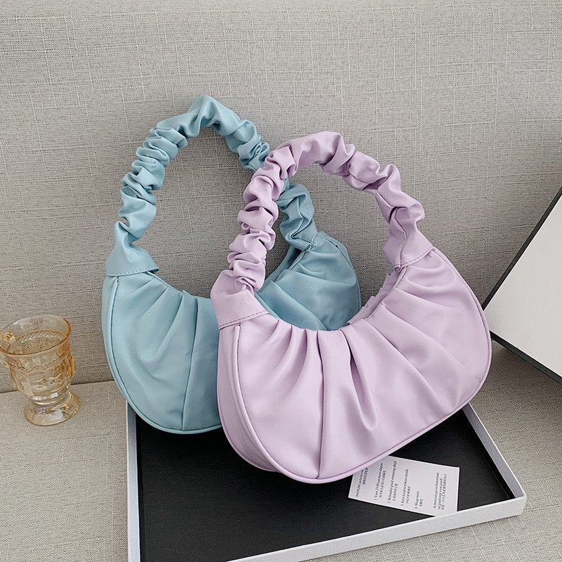 Foreign trade Korean version women's bag 2022 new solid color cloud pleated bag simple women's armpit bag sweet shoulder bag