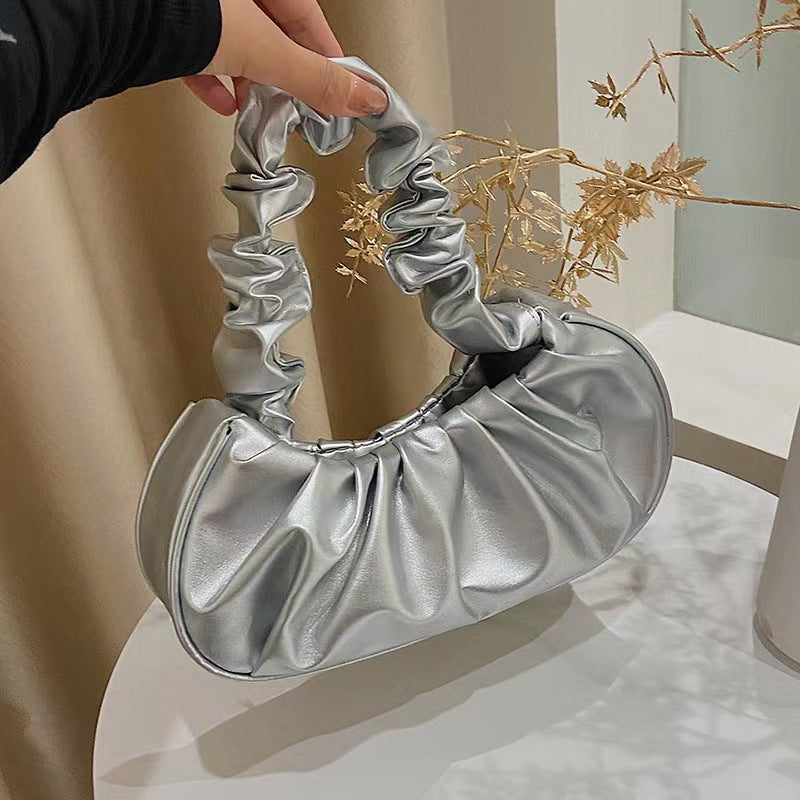 Foreign trade Korean version women's bag 2022 new solid color cloud pleated bag simple women's armpit bag sweet shoulder bag