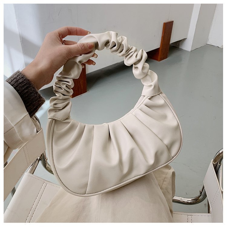 Foreign trade Korean version women's bag 2022 new solid color cloud pleated bag simple women's armpit bag sweet shoulder bag