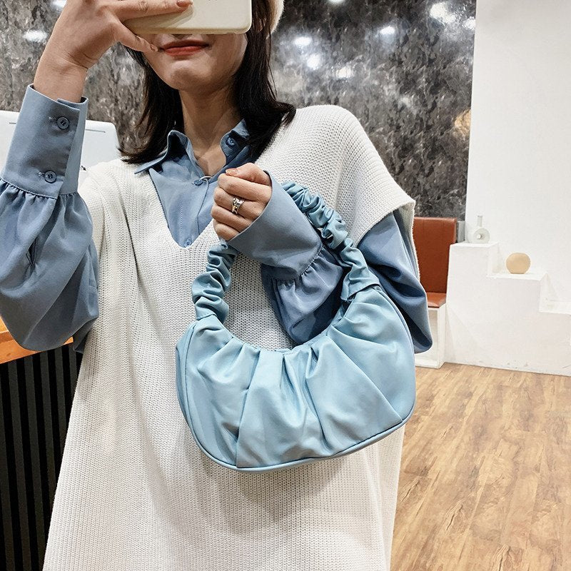 Foreign trade Korean version women's bag 2022 new solid color cloud pleated bag simple women's armpit bag sweet shoulder bag