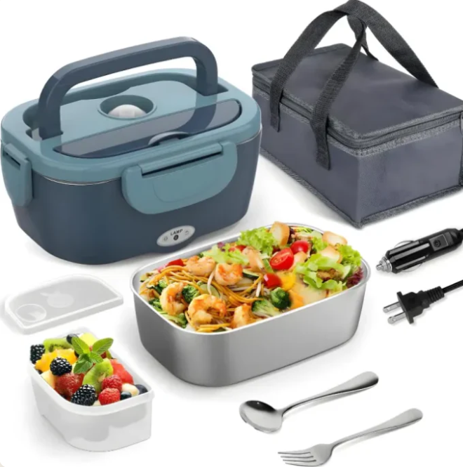 Lunch box set with food containers, utensils, and power adapter on a white background