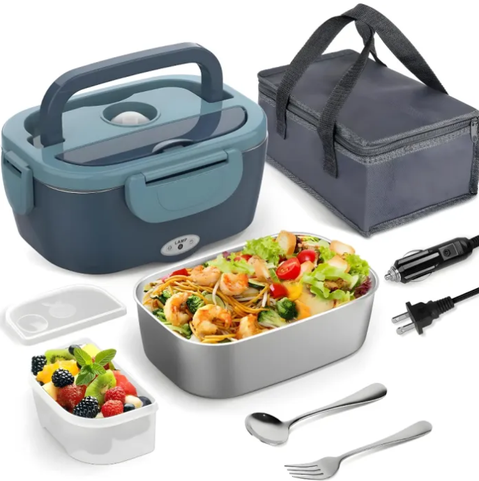 Lunch box set with food containers, utensils, and power adapter on a white background